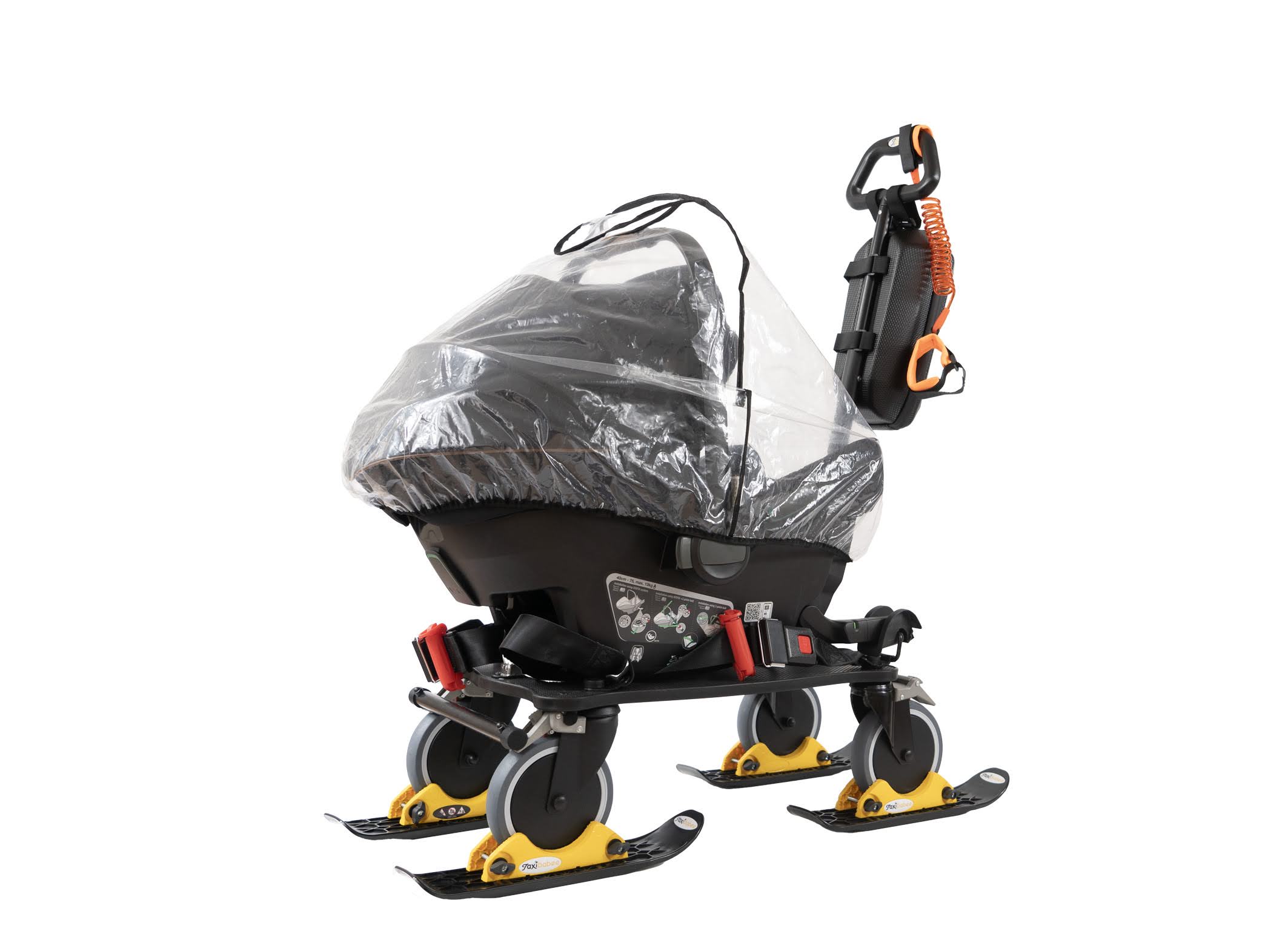 TaxiBabee avec coque bébé, habillage pluie et skis